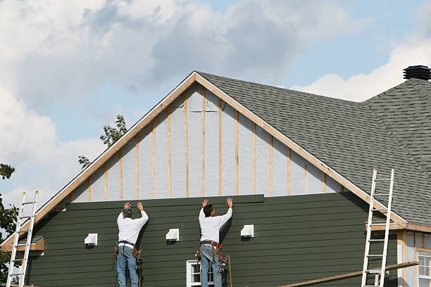 Professional Siding technician working in Swampscott, MA
